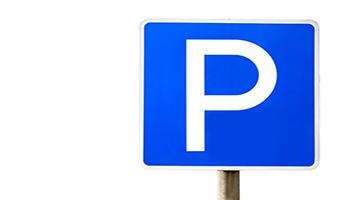 Blue and white parking sign